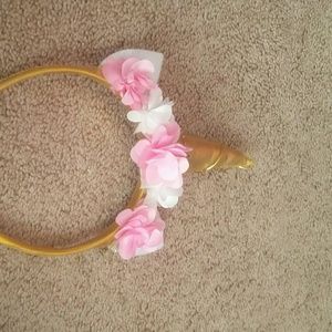 Two headbands both of them are unicorns